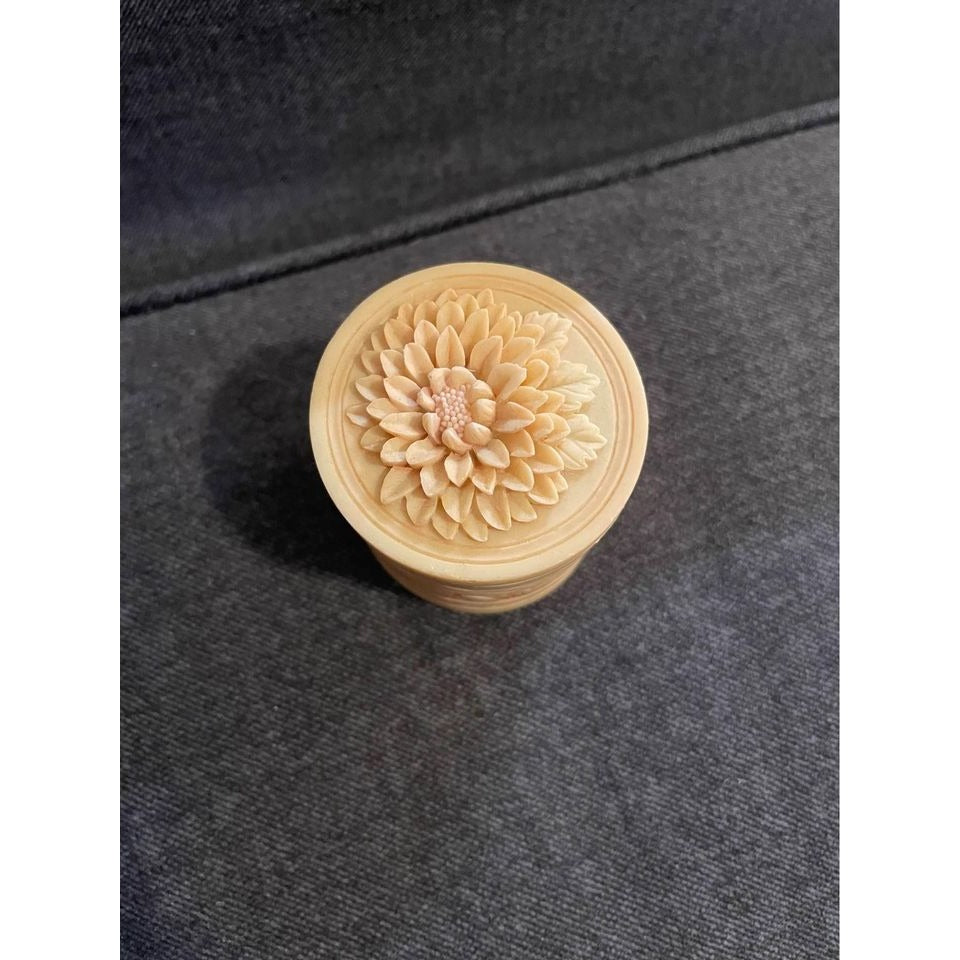 Small carved orange flower trinket box jar