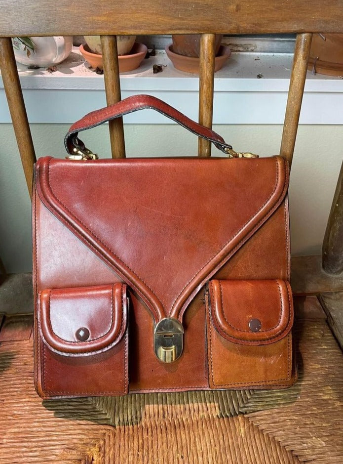 Vintage lamprom zipper made in Italy brown leather handbag purse